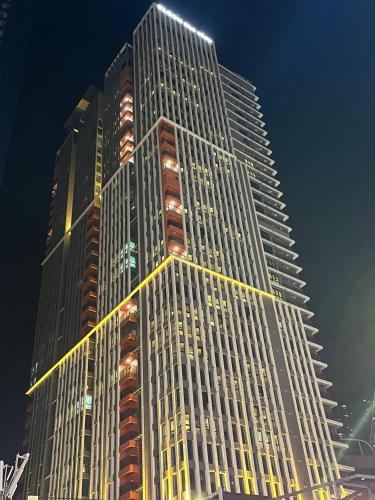 a tall building with lights on top of it at Haeundae La Mer in Busan