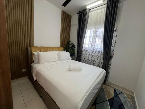 Ένα ή περισσότερα κρεβάτια σε δωμάτιο στο Alanis Residence KLIA