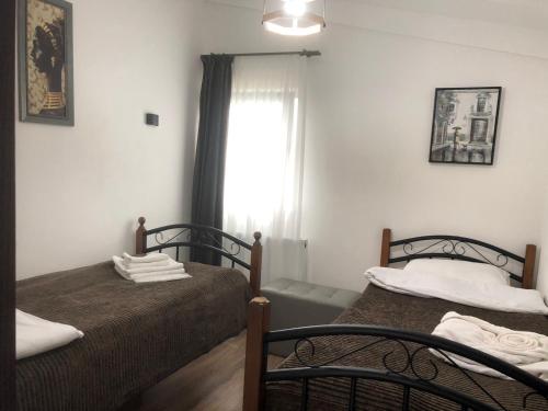 Postel nebo postele na pokoji v ubytování Verona Apartment