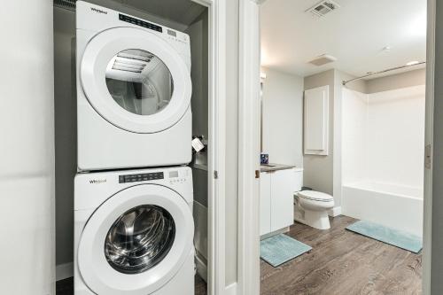 a white washer and dryer in a bathroom at Magnificent two bedroom in West Hollywood in Los Angeles