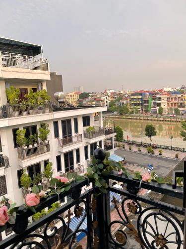 a view of a building from a balcony at C&K Premier Apartment Hai Phong in Hai Phong