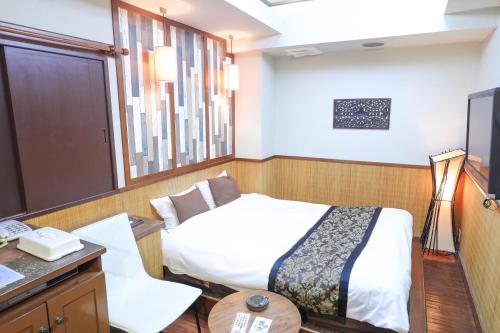 Postel nebo postele na pokoji v ubytování HOTEL B-Girl