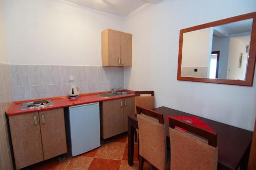Η κουζίνα ή μικρή κουζίνα στο Guesthouse Villa Gaga
