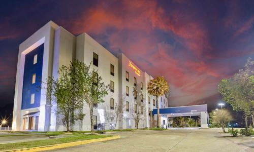 a rendering of a hotel at night at Hampton Inn Baton Rouge - Denham Springs in Denham Springs
