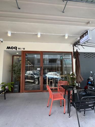 a restaurant with a table and chairs in front of it at Ps room 2nd floor Krabi Town in Krabi town