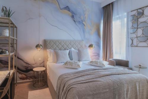 a bedroom with a large bed with a map on the wall at Rooms Indigo Bundek in Zagreb