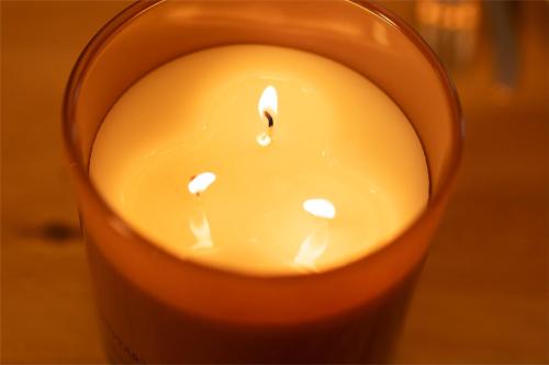 a candle sitting on top of a table at Standing, confort, centre ville,4 personnes in Saint-Étienne