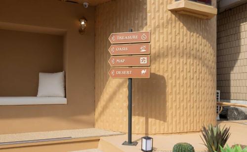 a street sign in front of a room at StayPassport Morocco Spa Incheon Songdo in Incheon