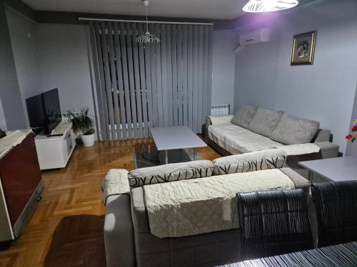 Svetainės erdvė apgyvendinimo įstaigoje Eleni Apartment
