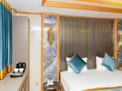 En eller flere senge i et værelse på Thái An Hotel Hồ Chí Minh