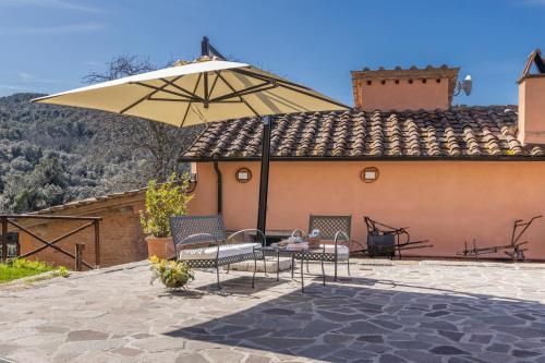 Un patio o zona al aire libre en Podere Bagnoli