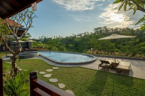 Bazén v ubytování Lumbung River Ubud Villas nebo v jeho okolí