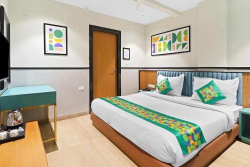 Katil atau katil-katil dalam bilik di Treebo Bella Vista, Shobhagpura