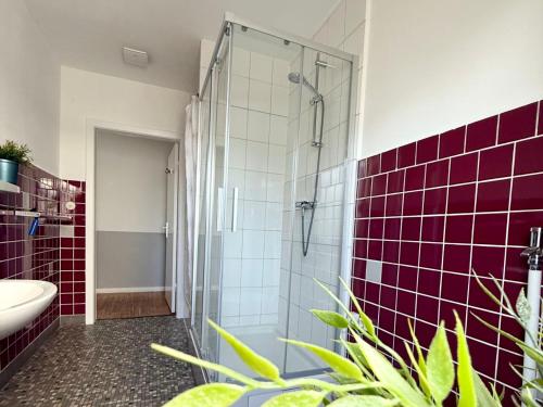a bathroom with a shower and a sink at Spacious House in Seevetal at Hamburg in Seevetal