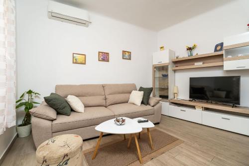 Posezení v ubytování Apartment Family Tokic