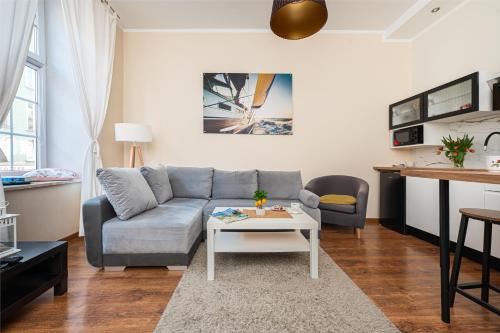 Posedenie v ubytovaní Długa Comfort Apartments