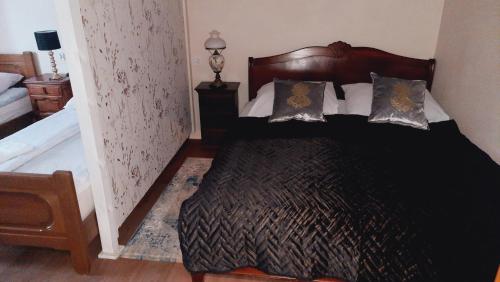 Кровать или кровати в номере Hotel Rezydencja Rosa