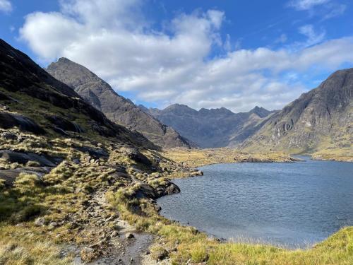 a view of a mountain lake in a valley at Pooltiel View in Milovaig