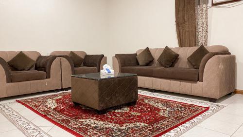 Posezení v ubytování رفاد بلس للشقق المخدومة خميس مشيط - REFAD PLUS Khamis Mushait