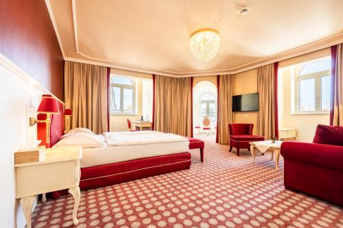 Postel nebo postele na pokoji v ubytování Aviano Boutique Hotel
