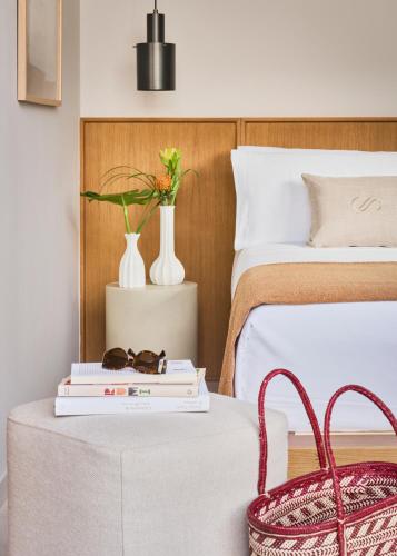 Postel nebo postele na pokoji v ubytování Royal Hideaway Corales Villas