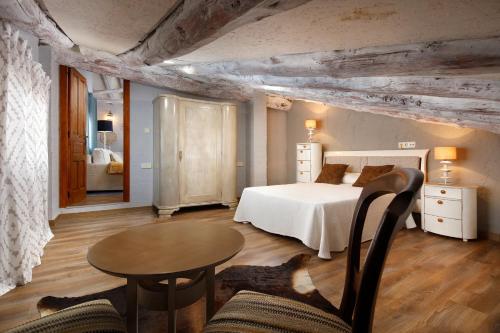 Postel nebo postele na pokoji v ubytování Hotel Villa San Jorge
