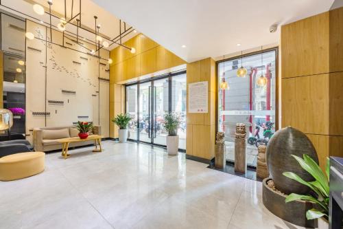 Zona de estar de Guangzhou Hongcheng Hotel