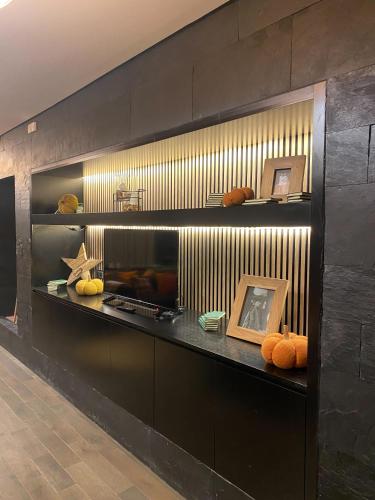 a room with a counter with some items on it at Aparthotel Siente Boí & SPA in Pla de l'Ermita