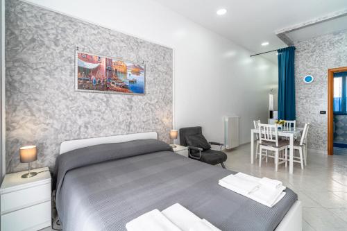 Ένα ή περισσότερα κρεβάτια σε δωμάτιο στο Casa Vacanze Blu Cobalto