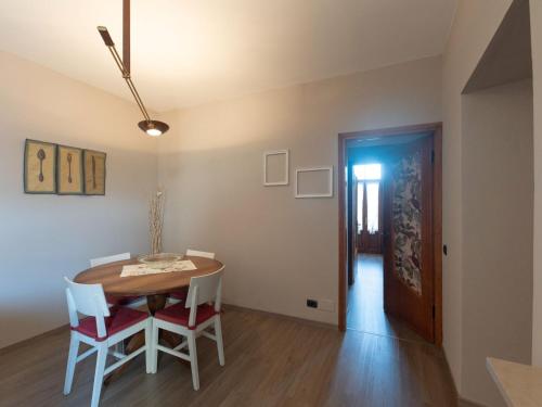 a dining room with a table and chairs at Apartment Bac 1 by Interhome in Mergozzo