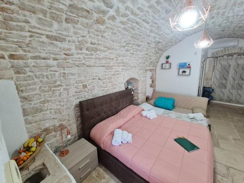 A bed or beds in a room at Perfetta Letizia