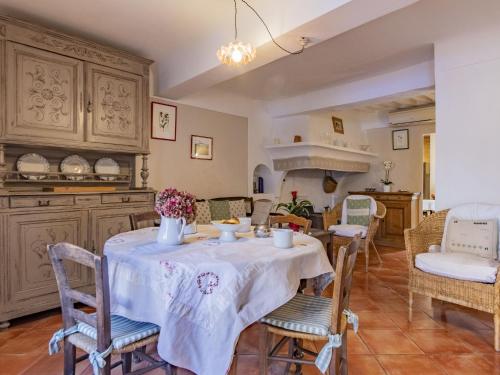 a kitchen and dining room with a table and chairs at Holiday Home Côté Place by Interhome in Villars