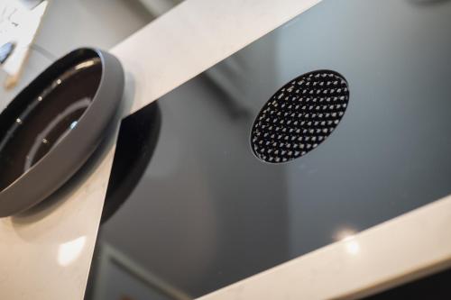 a close up of a kitchen appliance with a spatula at Greta s Hüs in Archsum