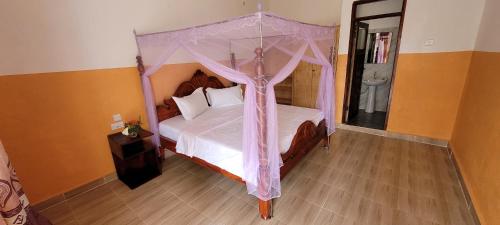 Krevet ili kreveti u jedinici u okviru objekta Kamengo Cottages