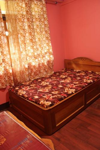 Ένα ή περισσότερα κρεβάτια σε δωμάτιο στο Yang-cha home stay