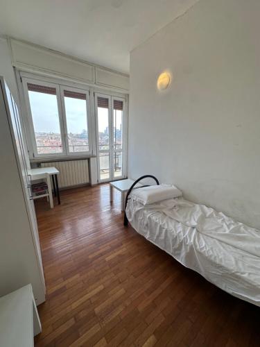 Postel nebo postele na pokoji v ubytování Piazza Vida 12 Palace