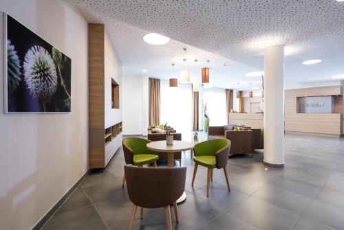 Posezení v ubytování OptimaMed Kurhaus Wildbad