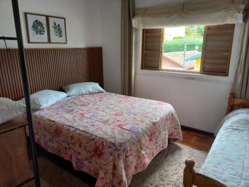 Postel nebo postele na pokoji v ubytování Casa Recanto