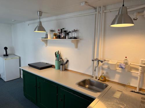 Nhà bếp/bếp nhỏ tại Cozy Studio Apartment right next to the City Hall
