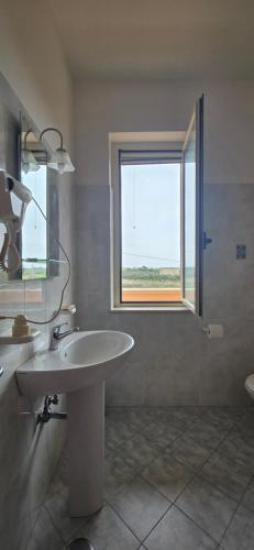 Koupelna v ubytování Hotel Ristorante La Decanata