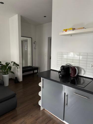 Kuchyň nebo kuchyňský kout v ubytování Apartamenty Młyńska15 self check-in 24h