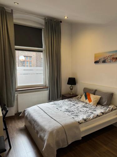 Postel nebo postele na pokoji v ubytování Apartamenty Młyńska15 self check-in 24h