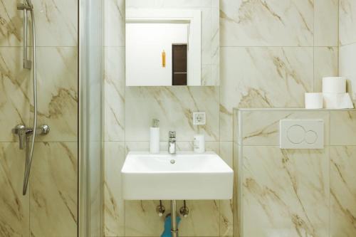 Koupelna v ubytování Apartman Sidro