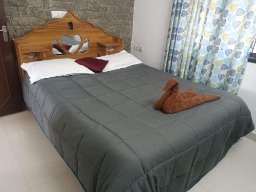 Postel nebo postele na pokoji v ubytování ECR Holiday