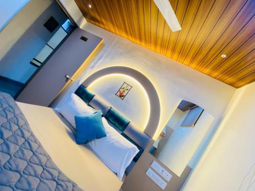 Postel nebo postele na pokoji v ubytování Hotel RV Residency