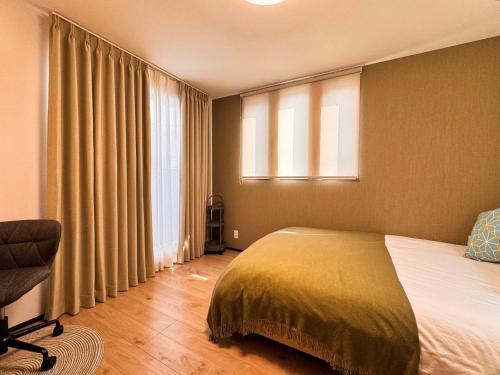 Postel nebo postele na pokoji v ubytování Home Stroy in Tokyo - Luxury Villa Minowa&Ueno-三ノ輪一戸建て&東京屋語