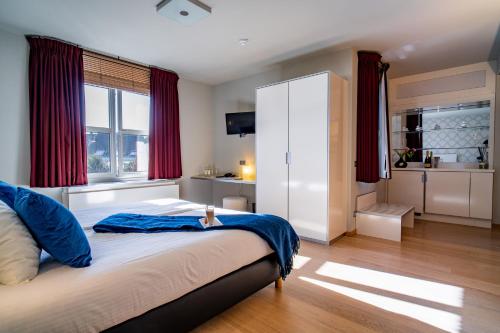 Voodi või voodid majutusasutuse Hotel Falko toas