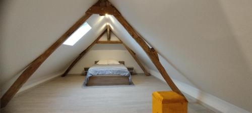 Postel nebo postele na pokoji v ubytování La sérénité en beai de somme