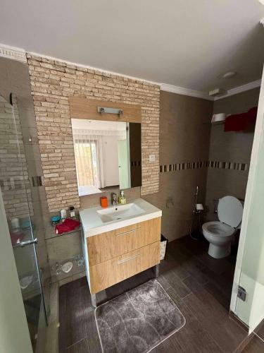 Koupelna v ubytování L'Appartement By PalmiResort