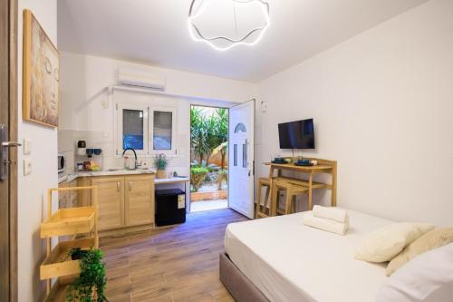 Ένα ή περισσότερα κρεβάτια σε δωμάτιο στο Aiolos Lux and Easy suite near the sea